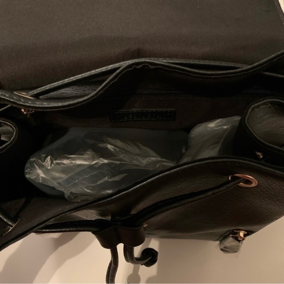 Woman’s faux leather backpack main image 4